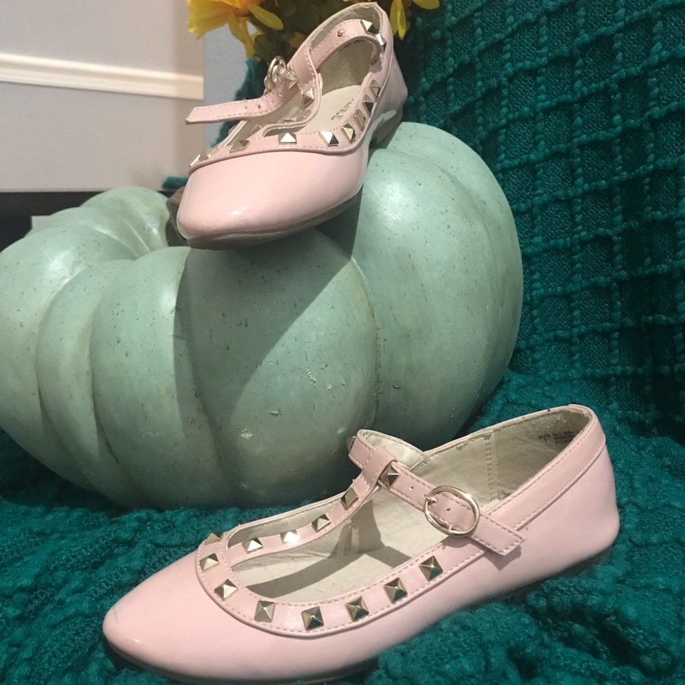 Girls flats. Children place shoes.